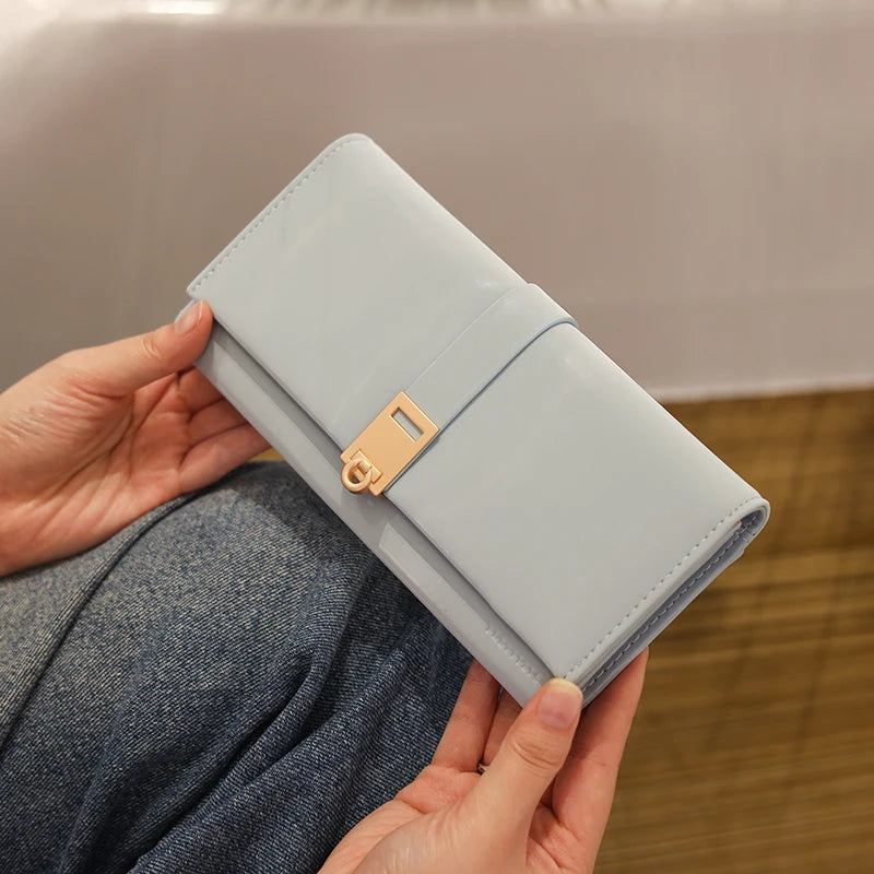 Autumn and winter new wallet women's long South Korea and South Korea small fresh PU leather solid color three fold bag simple s