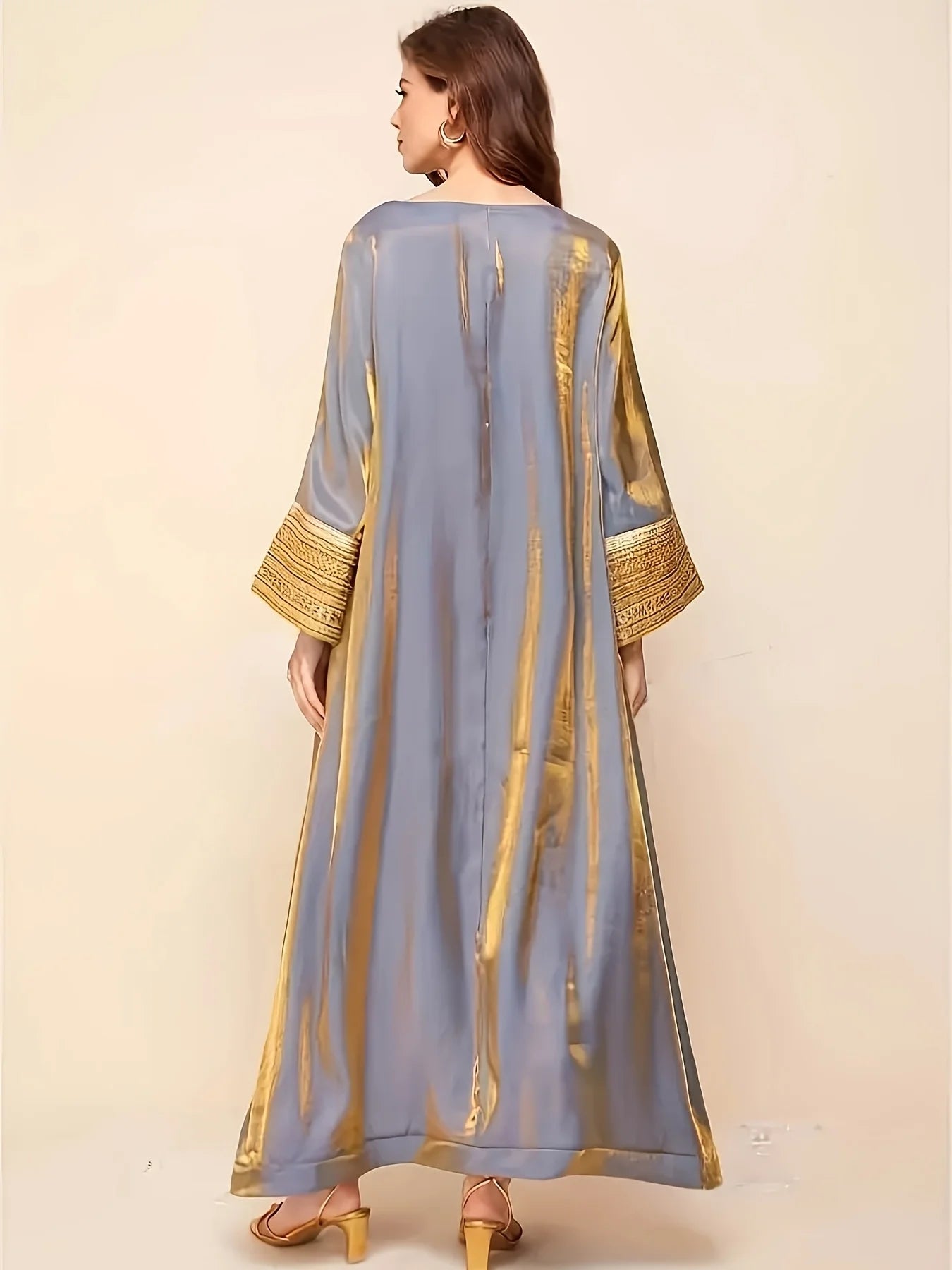 Abaya A Long Dress with a Round Neckline Featuring Directional Reflective Lace Decoration, Elegant Long Sleeves, And a Loose Fit