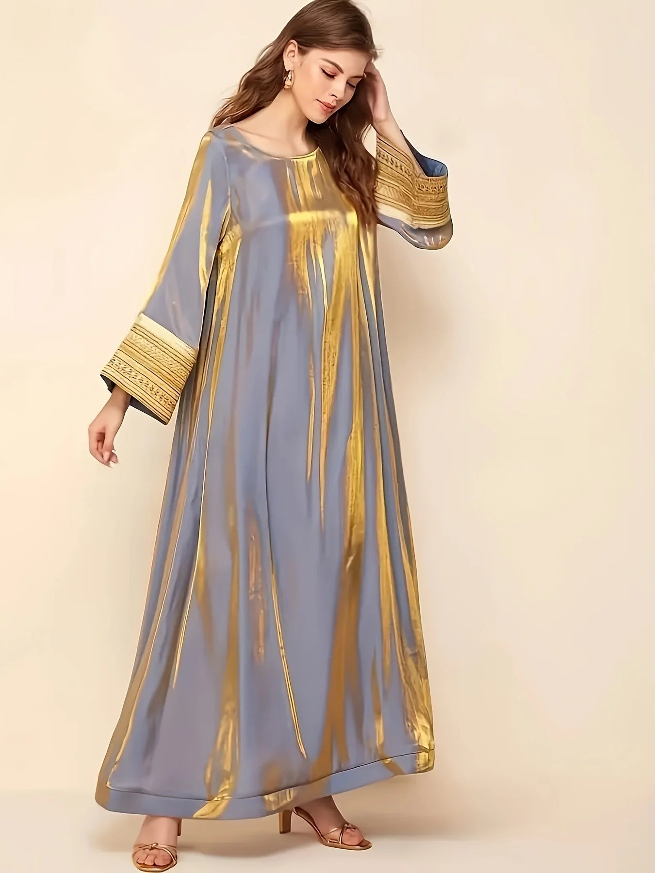Abaya A Long Dress with a Round Neckline Featuring Directional Reflective Lace Decoration, Elegant Long Sleeves, And a Loose Fit
